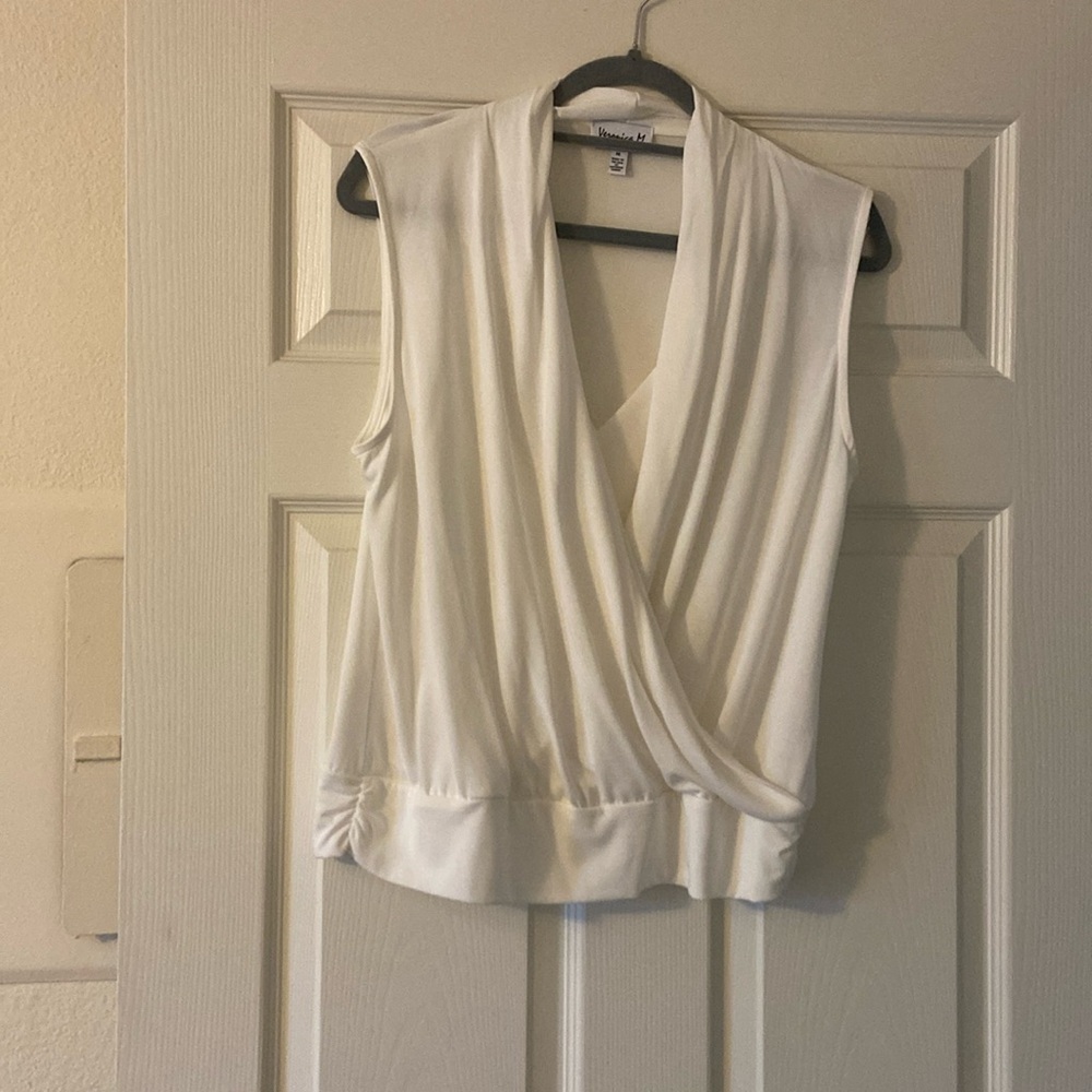 Brand new never worn Veronica M sleeveless top. Always in style.